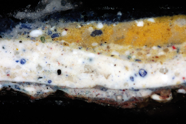 Cross section under plane-polarised light (100-200-400x)During the cross-sectional sampling, an area of about 1 × 0.5 mm is taken from the surface of the painting and then analyzed after preparation. It makes well-observable not only the ground layer, but also the superimposed colourful paint layers and the varnish layers of the artwork.